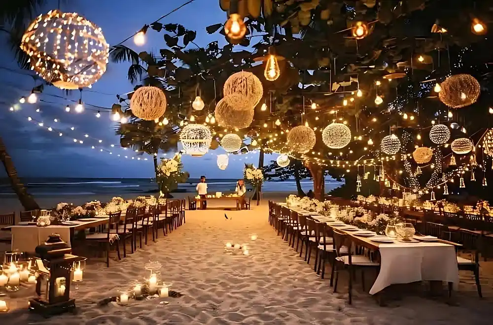 A romantic beach wedding adorned with string lights and lanterns, creating a magical atmosphere at sunset.