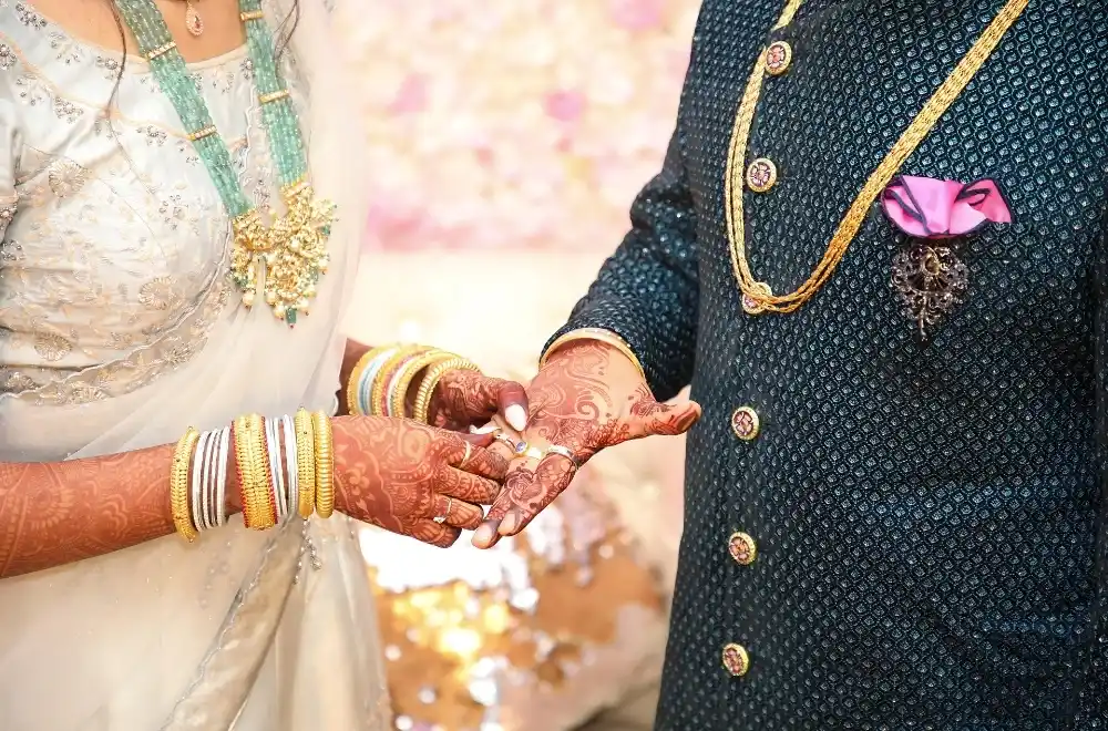 An elegant Indian wedding ceremony, featuring colorful decorations, traditional attire, and a festive atmosphere.