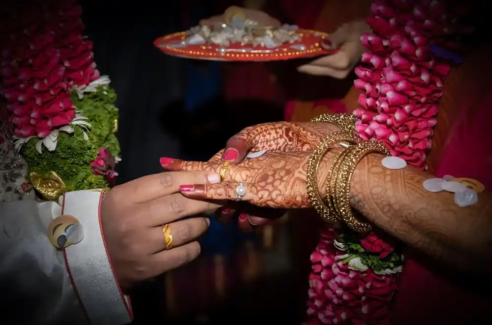 A lively Indian wedding ceremony, highlighting cultural traditions, elaborate decorations, and the joy of the celebration.
