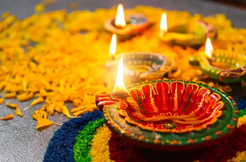 A vibrant Diwali celebration showcasing Indian traditions, with colorful decorations and joyful gatherings of people.